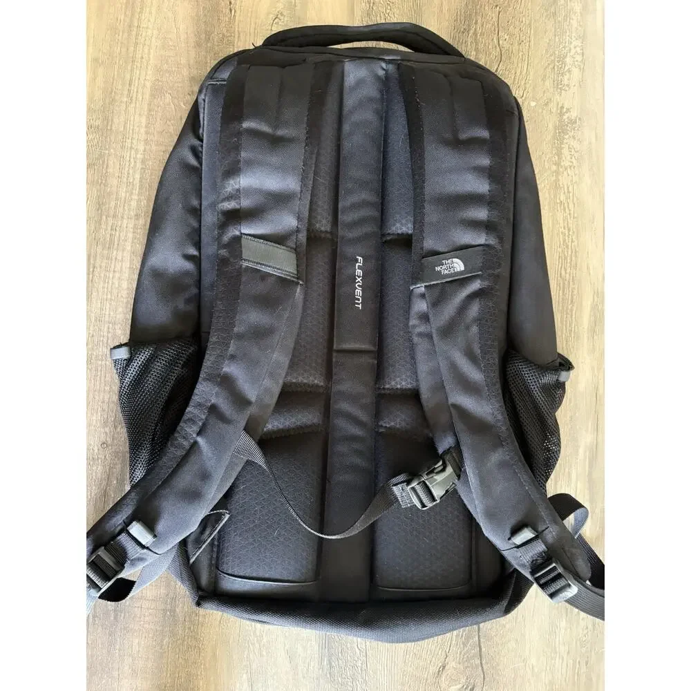The North Face Stalwart Black Backpack 26L Laptop Sleeve Company Logo